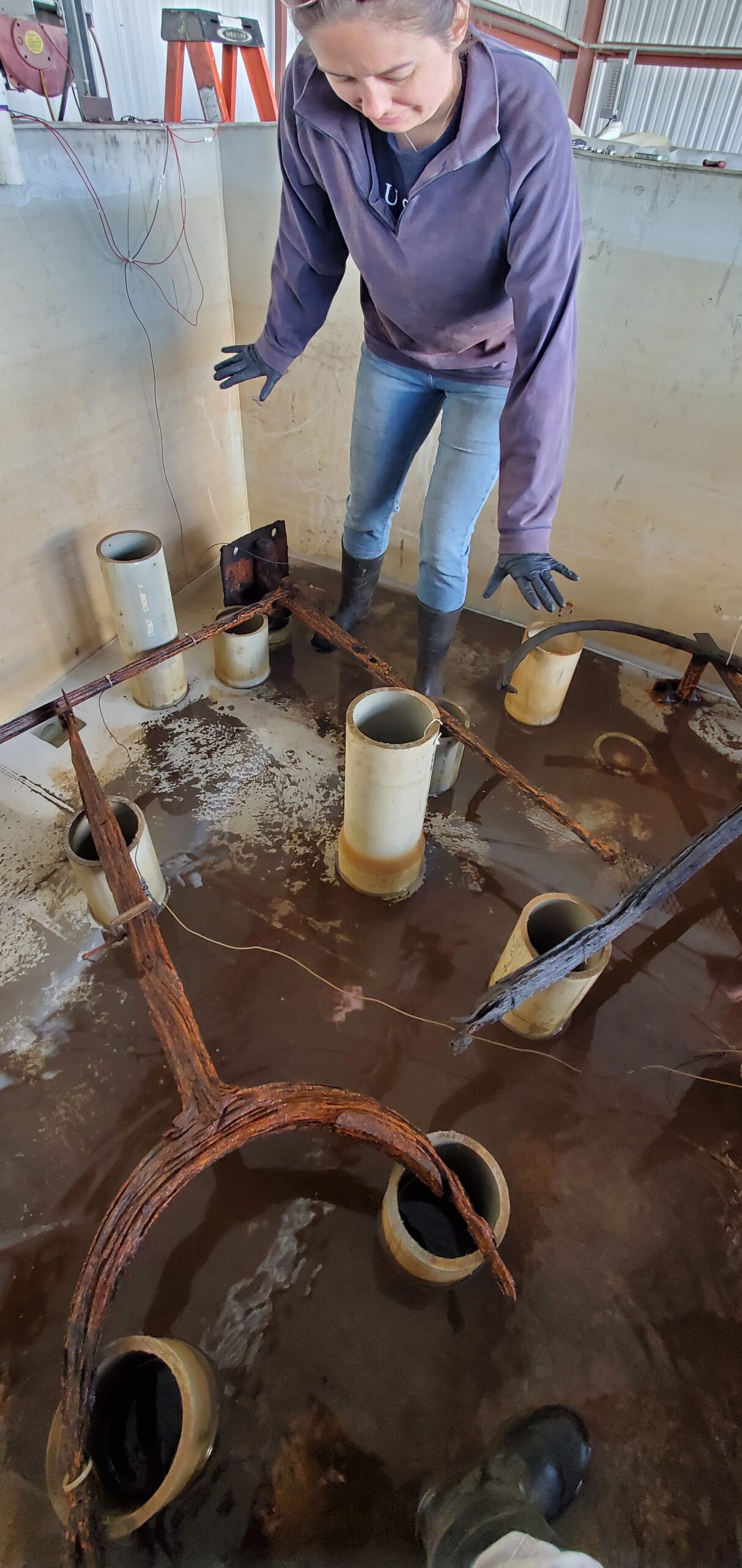 Archaeological Conservator Lesley Haines getting ready to re-position one of Monitor’s objects.