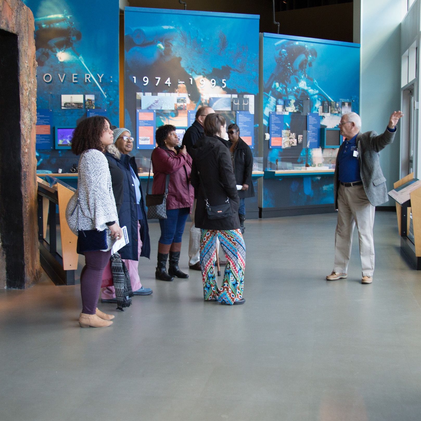 group of adults enjoying a tour led by a Museum docent